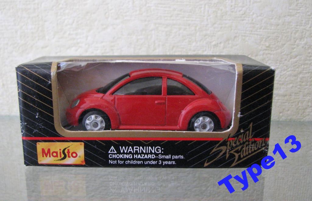 MAISTO: VW New Beatle длина модели 72,5мм металл в коробке 5942