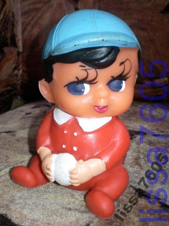 Игрушка резиновая.