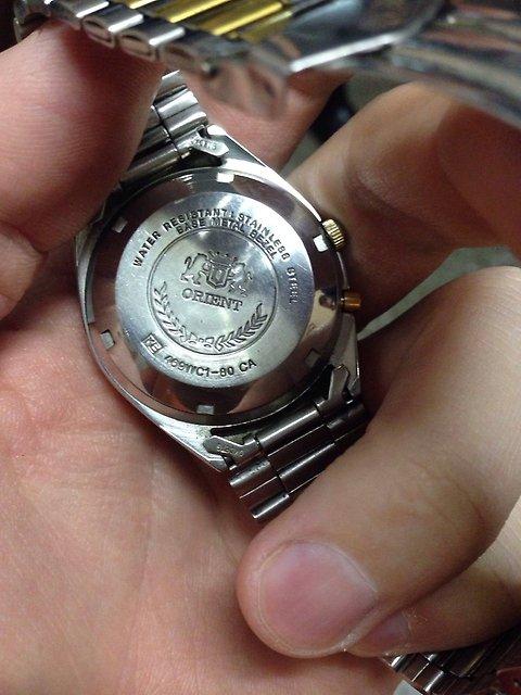 Хорошие часы до 5000 рублей. Часы Orient Titanium Automatic 50m. Ориент Титаниум 50 автоматик. Задняя крышка часов. Крышка часов Orient.