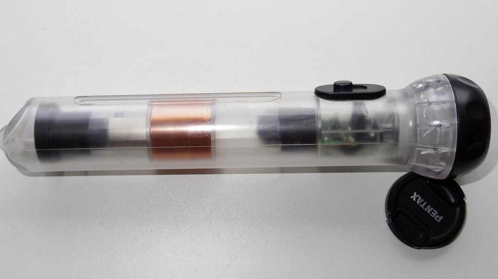 Фонарь индукционный с ручной подзарядкой рабочий!(НОВЫЙ)!!!