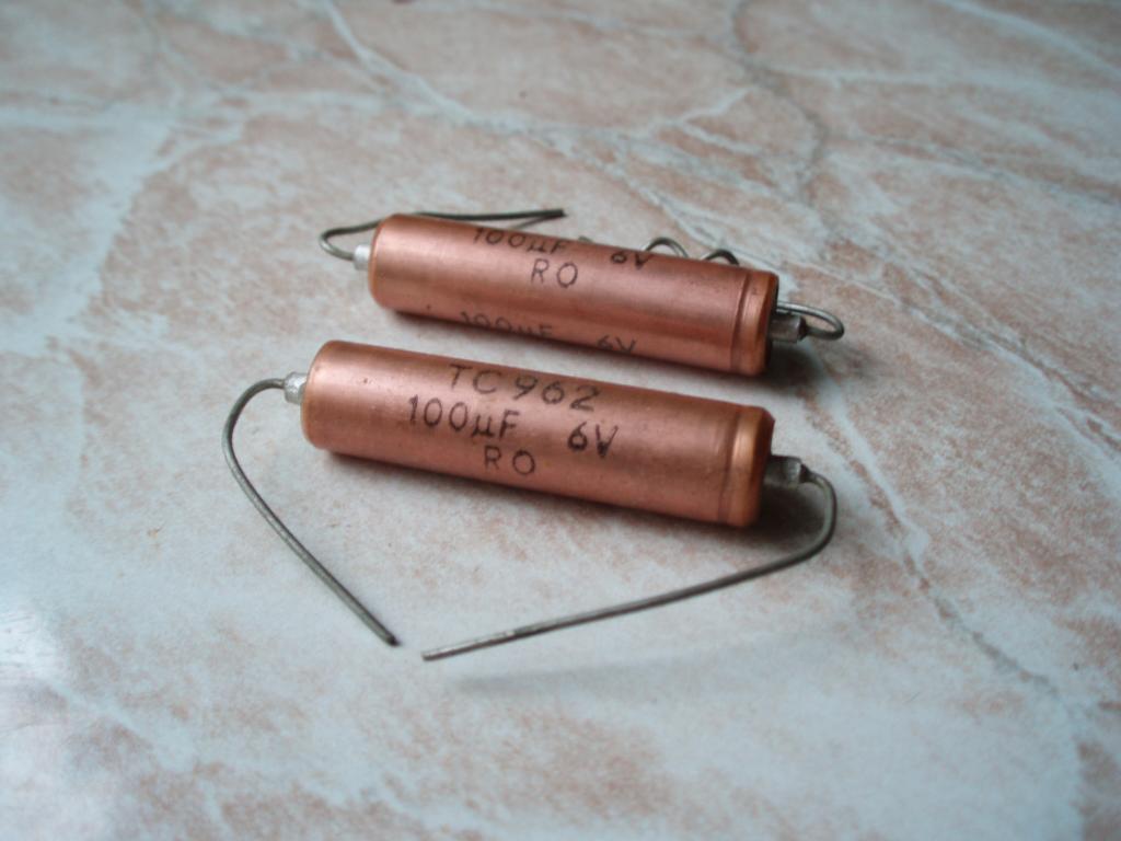 10мкф 400v конденсатор. 400v 333j. Конденсатор 104 250v. Конденсатор tesla tc 903 100 мкф 12в. U t c конденсатор.