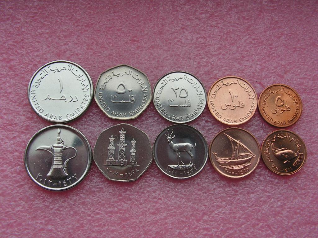Дирхамы купить в спб по выгодному курсу. Дирхам ОАЭ 10 Монетка. 25 Филсов дирхам ОАЭ. Арабские дирхамы монеты. Арабские дирхамы монеты 25 филсов.