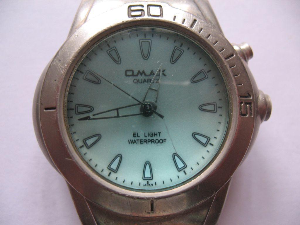 Часы omax quartz. OMAX Quartz 19023g. Часы OMAX Quartz Waterproof. Часы Qmax Quartz Crystal. Часы омакс кварц Кристалл водонепроницаемые.