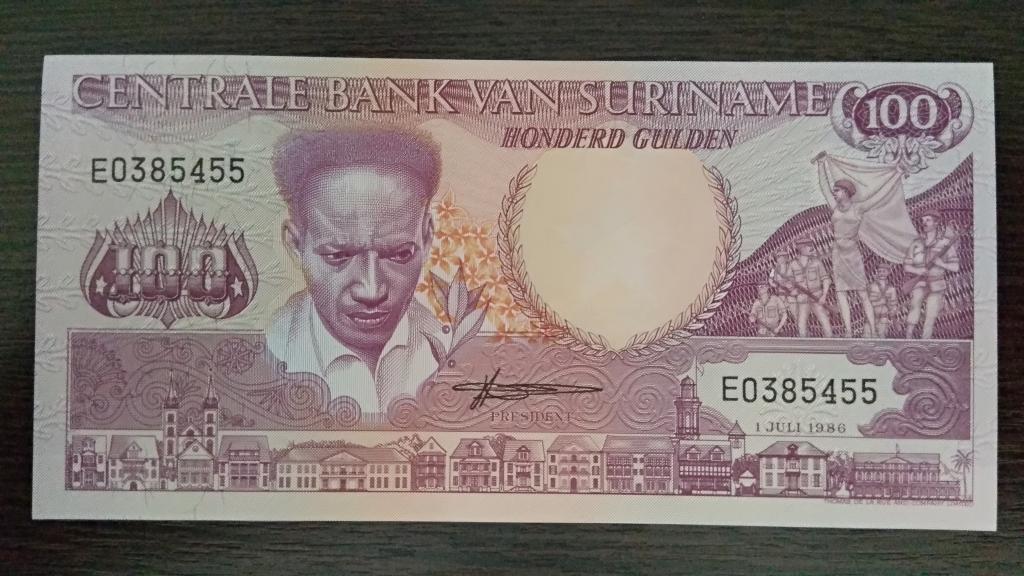 Банкноты.Суринам.1986.100 гульденов.Пресс