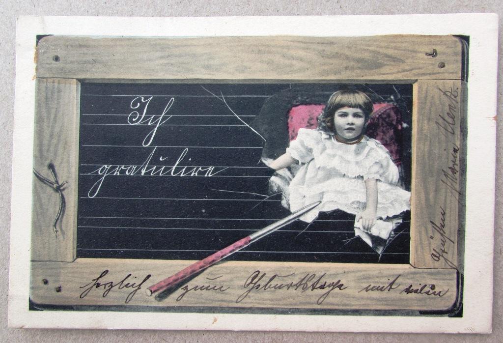 Девочка в пышном платье на фоне грифельной доски Штемпель 1905