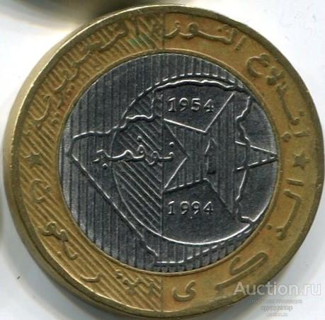 Алжир 50 динаров 1994 года. 40 лет революции. Биметалл