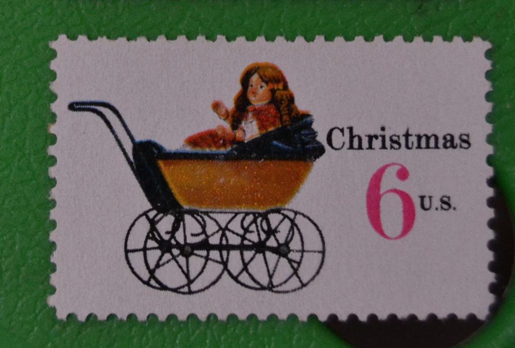 США 1970 г. Рождество. Детские игрушки.Кукла в коляске MNH