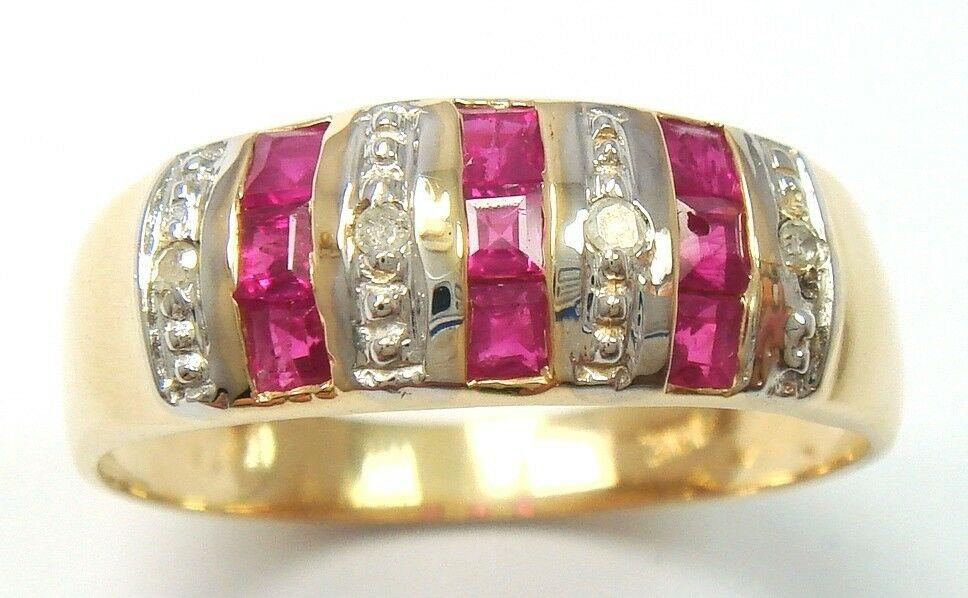 Кольцо золото 375 пр. Рубины бриллианты Размер 17.5