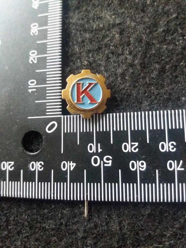 Иностранный знак на иголке "K" (фирма, завод)