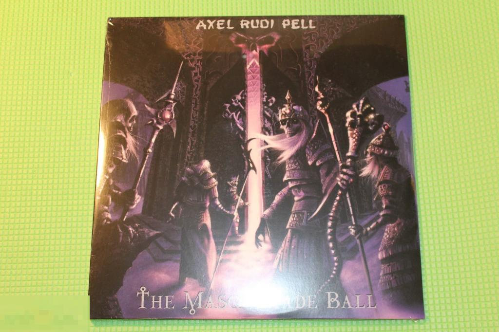 Axel rudi pell hallelujah. Axel Rudi Pell-2000-the Masquerade Ball. Axel Rudi Pell Diamonds Unlocked II 2021 обложка CD. Axel Rudi Pell the Masquerade Ball. Axel Rudi Pell Masquerade Ball обложка.