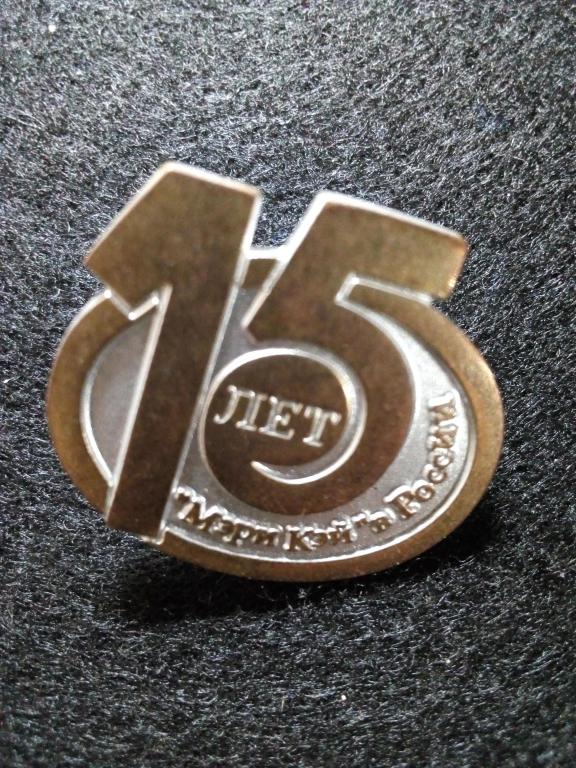 знак "Мэри Кей" в России
