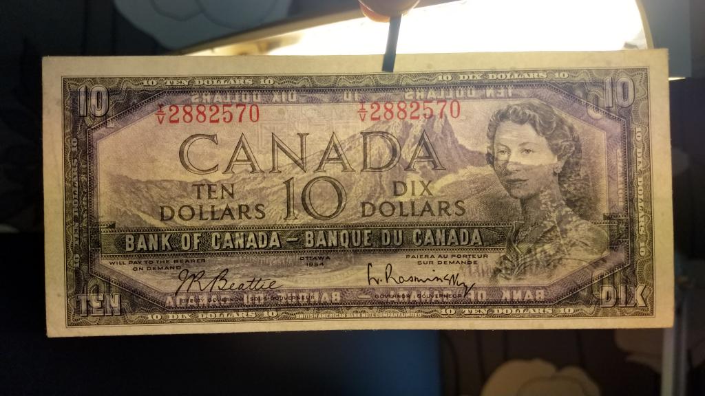 25 долларов это сколько в рублях. 10 Канадских долларов. Канадский доллар 1954 года. Картинка счастливая купюра зарплаты царской и жизни барской. Банкнота в 1 доллар канадская 1954.