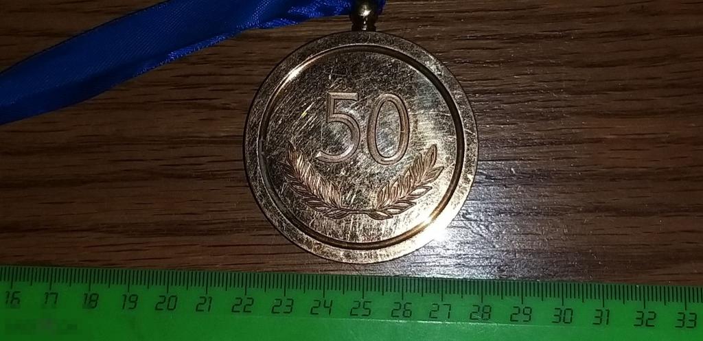 Медаль.Бронза. 50 лет.Тяжёлая. Подарок.Сувенир.Нож?Гарда? Подарок. 