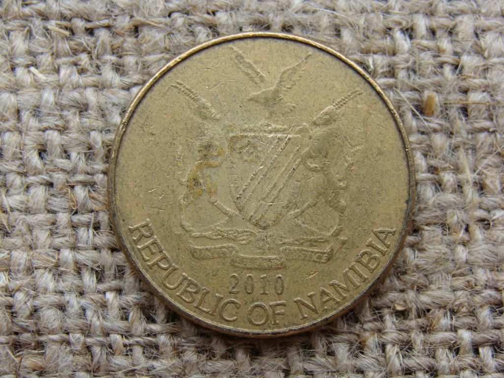 2010 долларов в рублях. 1 Доллар монета фото.