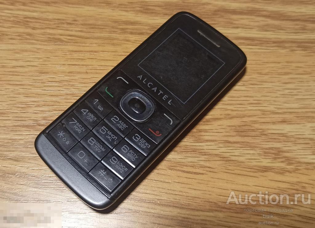Телефон  Alcatel OT 233 на восстановление или запчасти . 