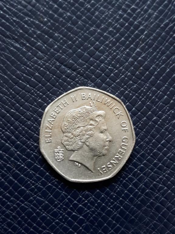 Гернси 20 пенсов 1999 КМ 90