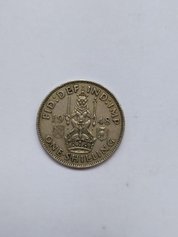 Великобритания. 1 шиллинг 1948 год/сидит на короне/ Георг VI.
