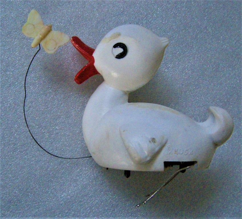 Шагающая Утка. Прыгающая утка. Утка с бабочкой. Утка. Бабочка. Механическая игрушка. Заводная утка