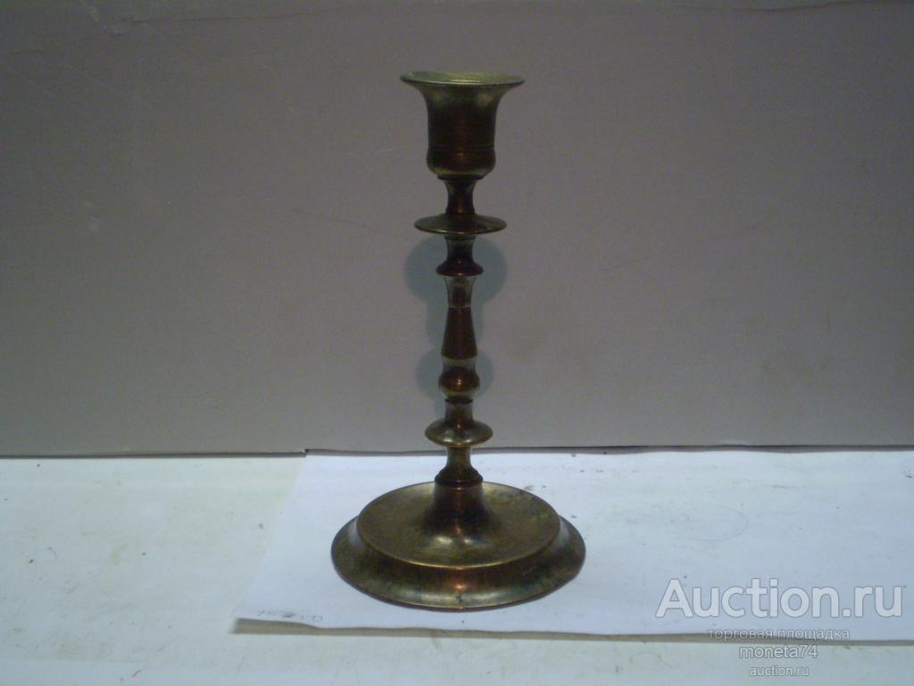 Старинный бронзовый подсвечник. Высота 18,5 см.