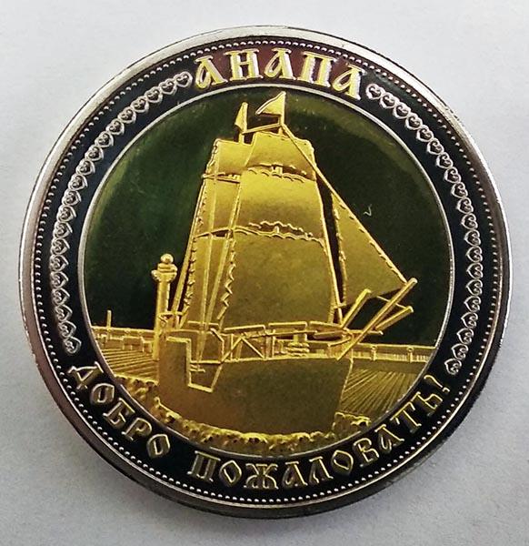 Сувенирная эксклюзивная коллекционная монета. Без номинала С изображением памятных мест России.