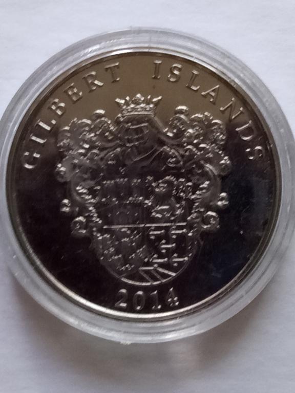 монета о-ва Гилберта(капсула). 1 доллар. АНЦ.unusual.