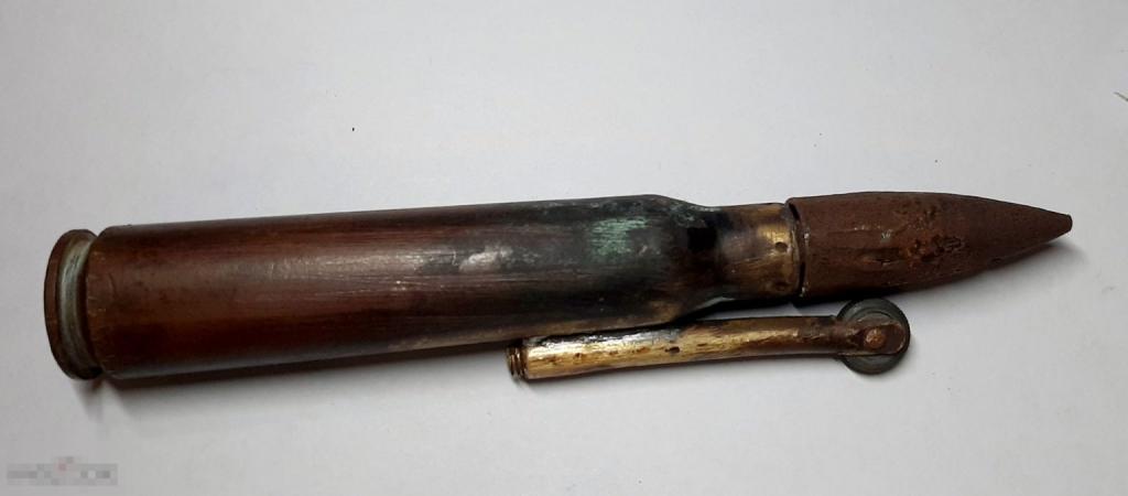 Старинная зажигалка. Сделана из ДШК на ВОВ из окопа 