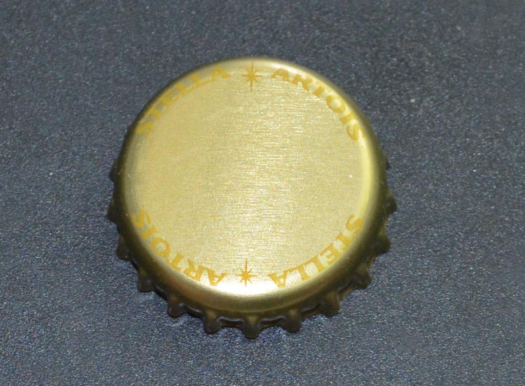 Кронен-пробка из России. STELLA  ARTOIS Золотистая. надписи по кругу