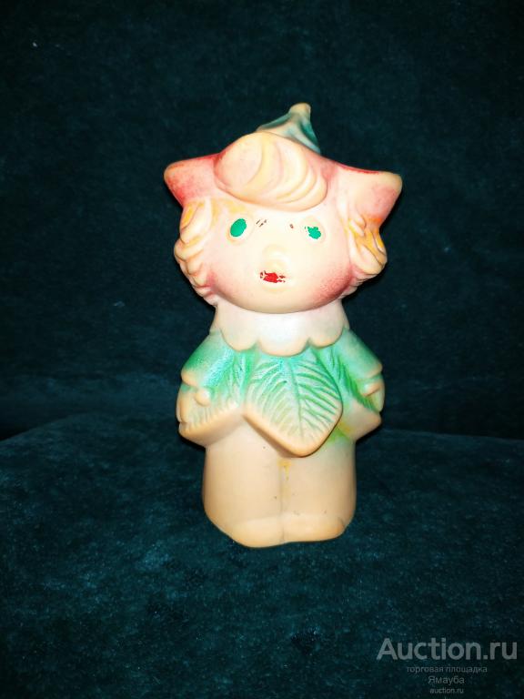 Игрушка резиновая девочка в цветочном наряде (незнайка)