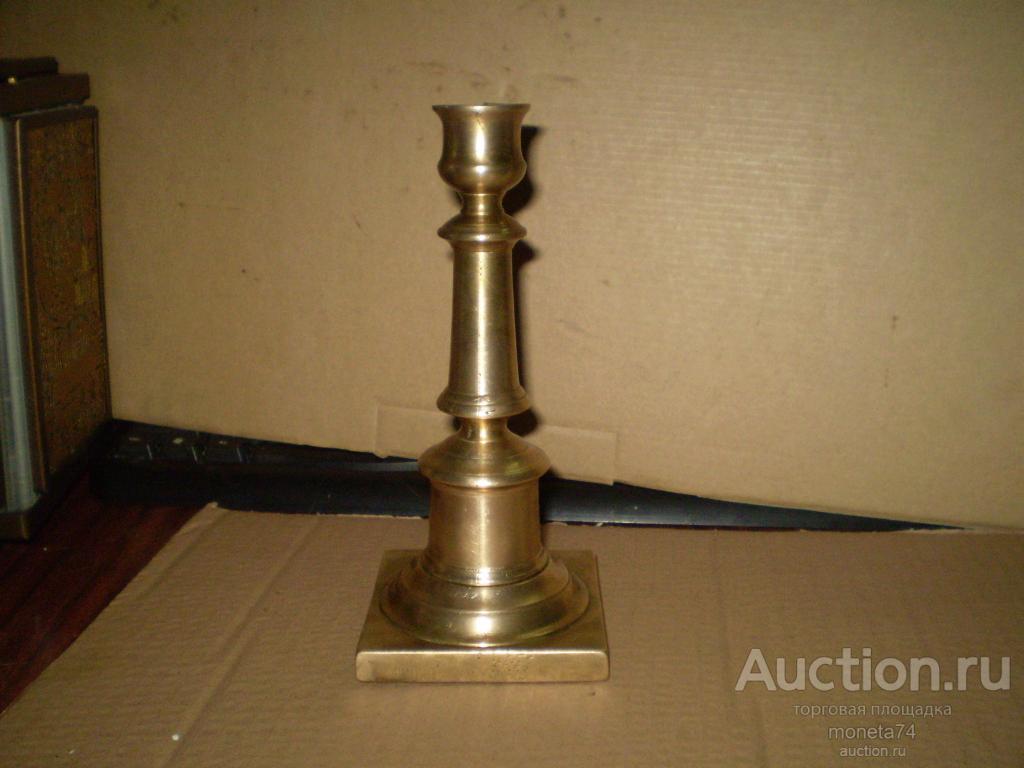Старинный бронзовый подсвечник в виде стелы. Высота 18,7 см. Дефект.