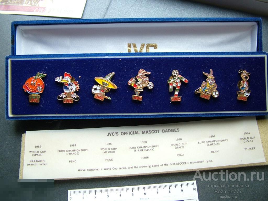 Знаки   талисманы  футбольных чемпионатов, официальный спонсор JVC