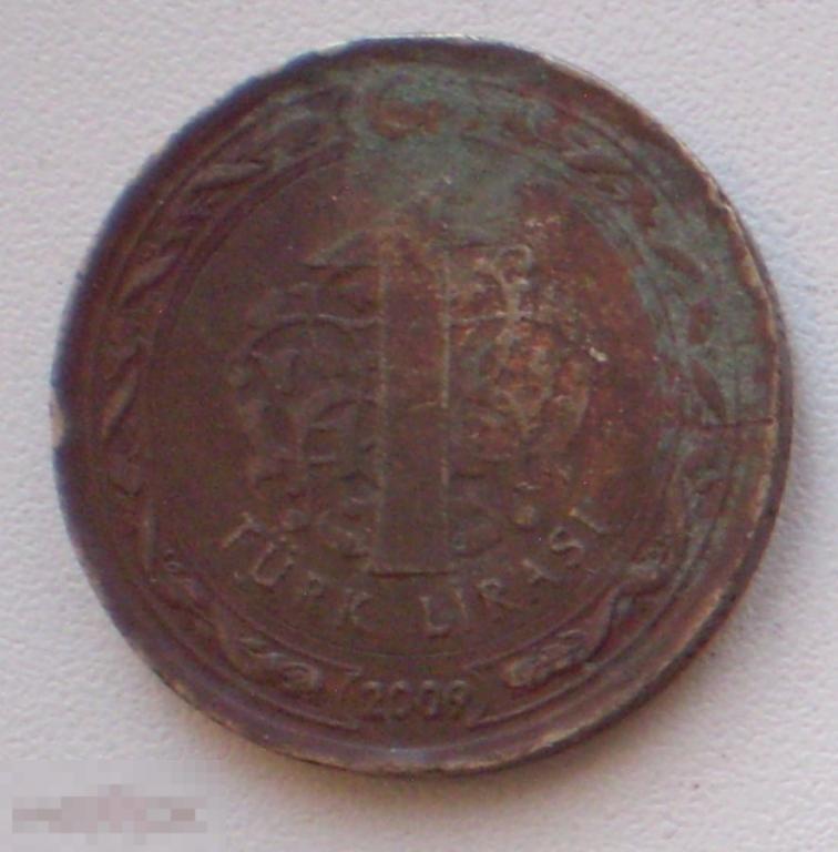 Турция. 1 турецкая лира. 2009 г. Потемнела