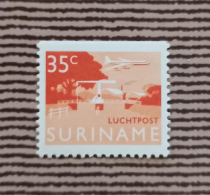 Суринам 1976 год Мост Поелепантье и самолет MNH