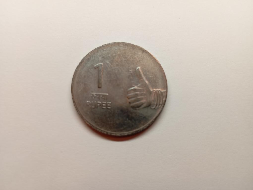 Монета Индия 1 рупия 2010 года (Н 106)