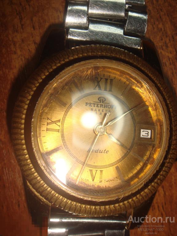 Мужские часы " РАКЕТА " Peterhoff Россия , на ходу - механика с браслетом № 289 , новое стекло .