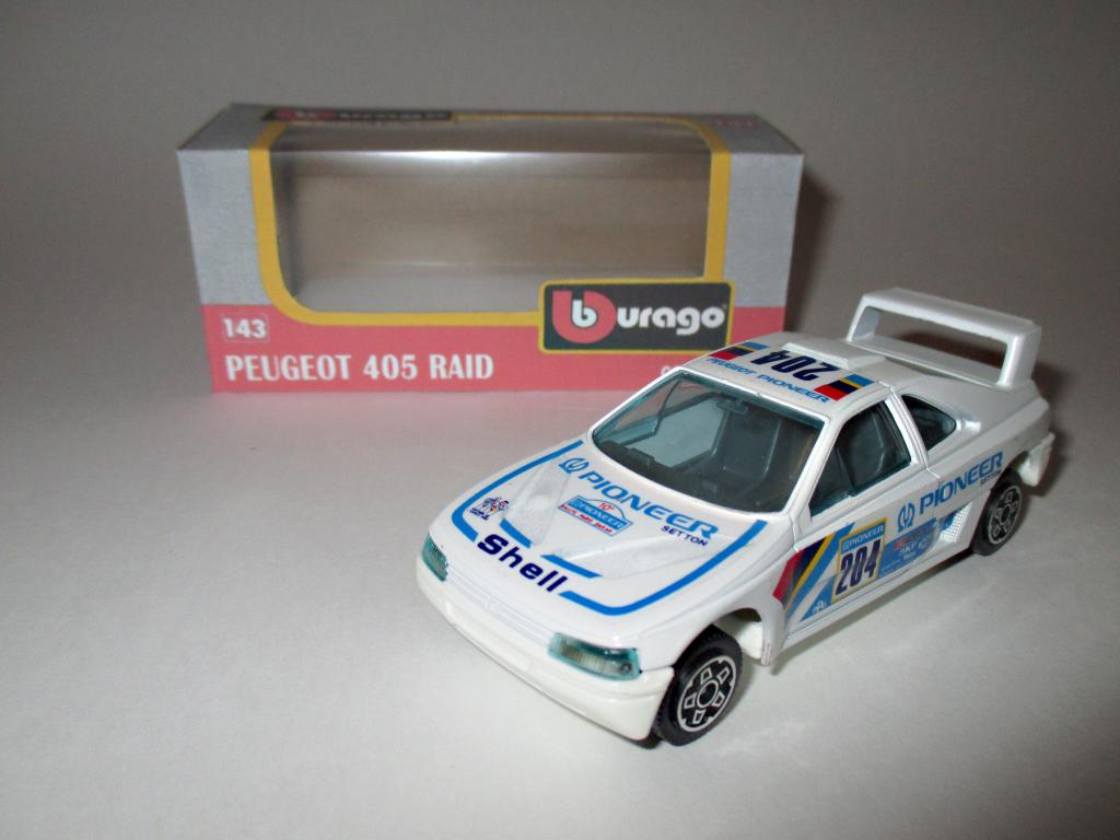 модель авто 1-43 Peugeot 405 Raid / Пежо 405 Раид (Burago ) читайте описание !!!