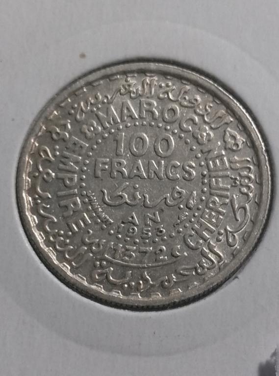 Монета Морокко 100 франков 1953 года , Серебро .