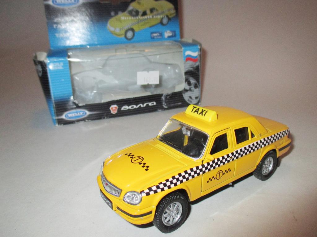 модель авто GAZ 31105 Volga Taxi / ГАЗ 31105 Волга Такси (WELLY) Читайте Описание!!!