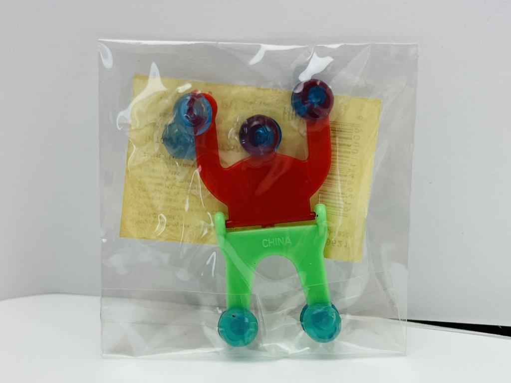 Игрушка-липучка - Человек. Сползает по стеклу. Красно-зеленая. Синие липучки 