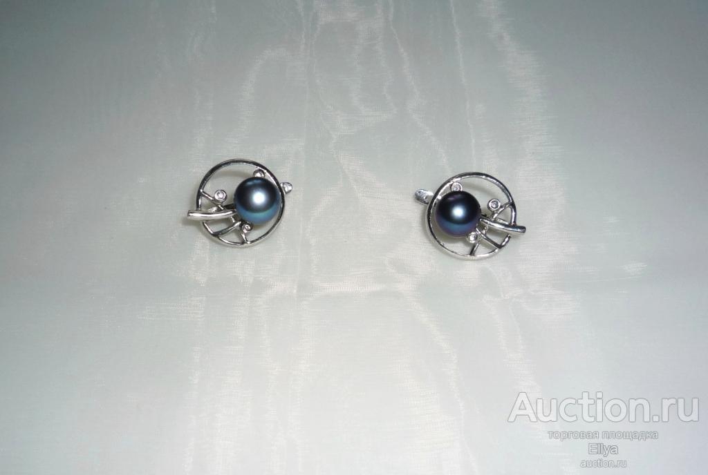 Серебряные серьги с черным жемчугом.
