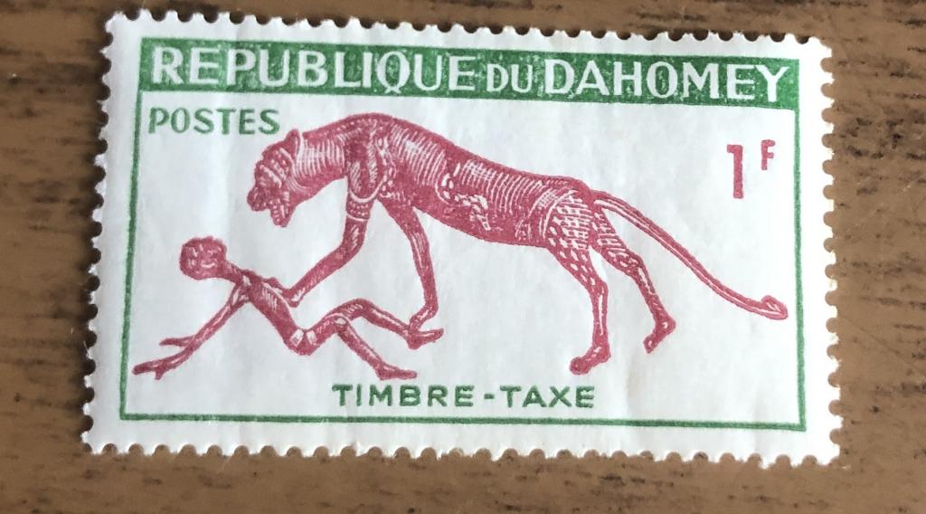 Марки Дагомея  1963 г Пантера над человеком доплатная