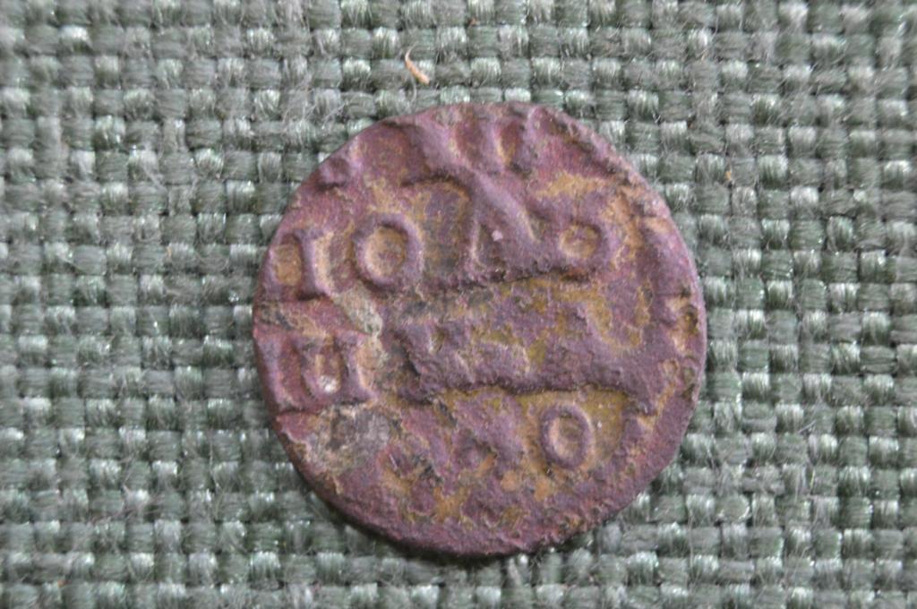 Монета Полушка 1720 года. Петр I, Российская Империя.