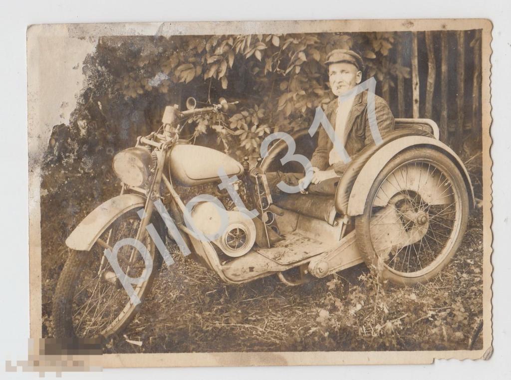 Мотоцикл мотоколяска с ручным управление.