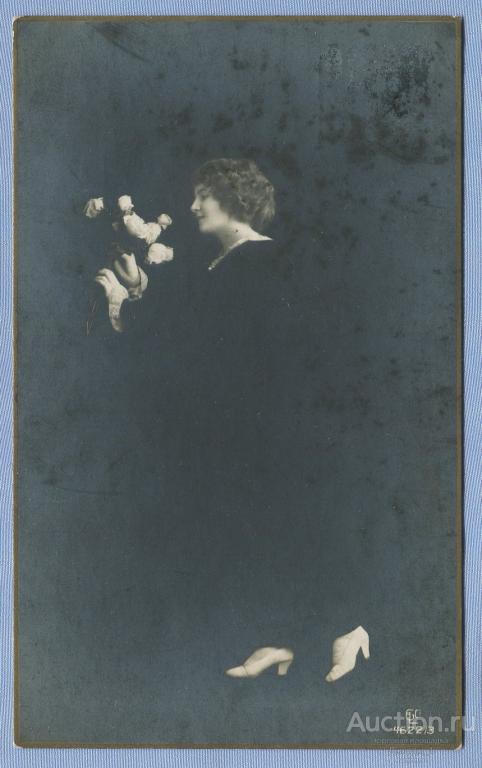 Девушка с цветами Штемпель "С.П.Б.ВОКЗАЛ - ВАРШАВА" 1914  К385