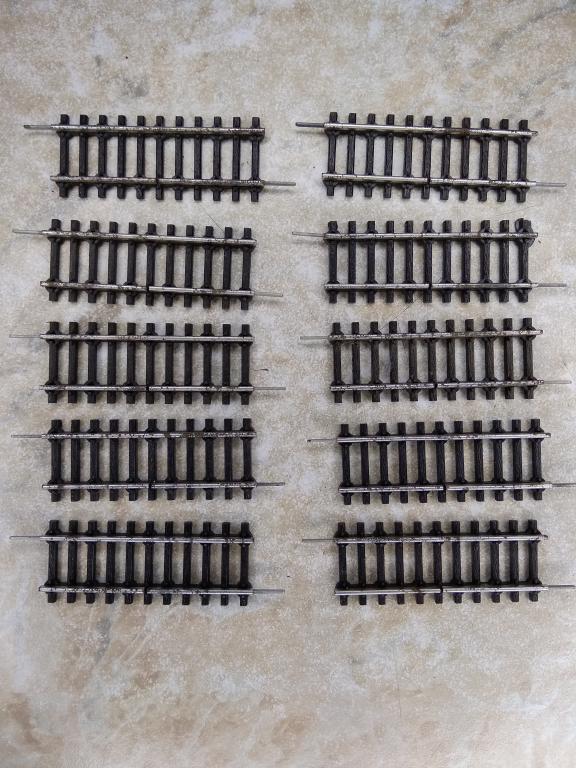 12мм.(TT) Рельс прямой 57мм.с разрывом 10 шт.,со следами коррозии