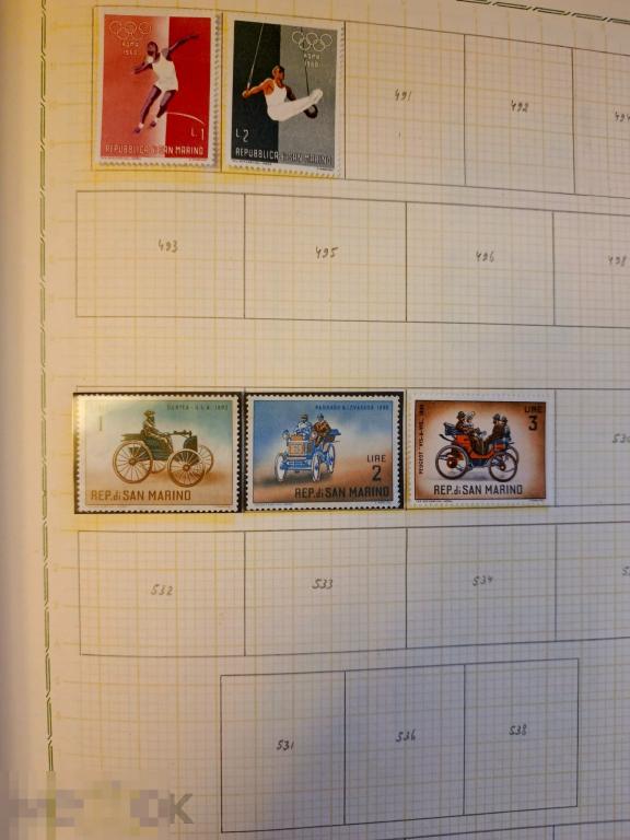 Альбом. Страница с марками Сан Марино. Гашеные, чистые