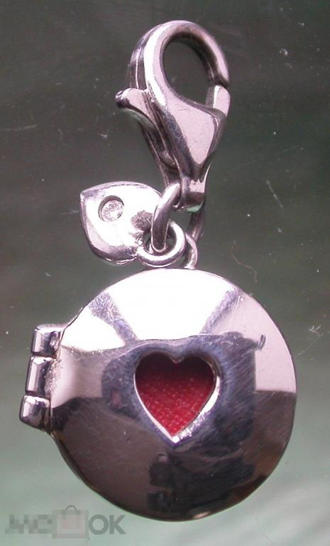 Серебряный открывающийся шарм-медальон. 925 проба. 3.9 гр. Новый.